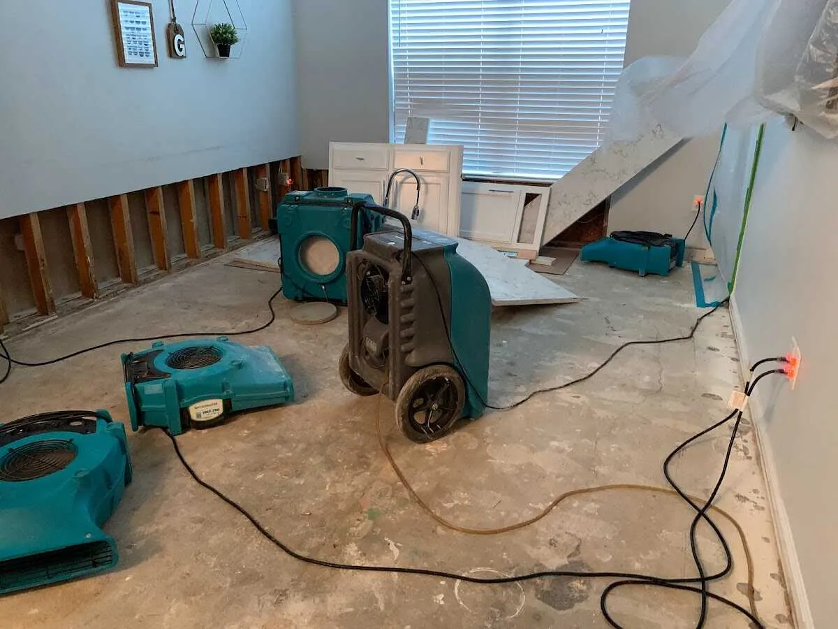 Dehumidifier in flood-cut room for Water Damage Restoration in Ada